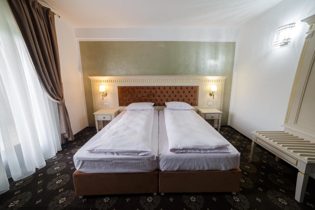 Отель Grădina Mariajelor Hotel Кымпулунг-Молдовенеск